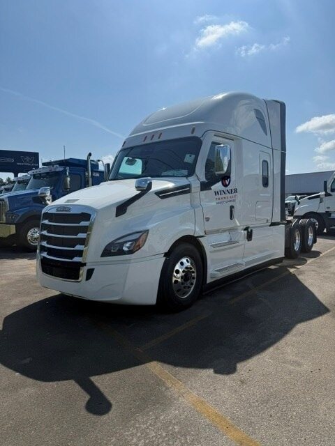 Winner Trans LLC Freightliner Cascadia sleeper tractor, driver side